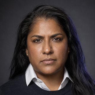 Photoreal portrait of Priya, API Designer