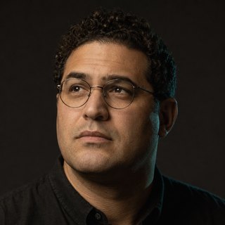Photoreal portrait of Ezra, Debugger