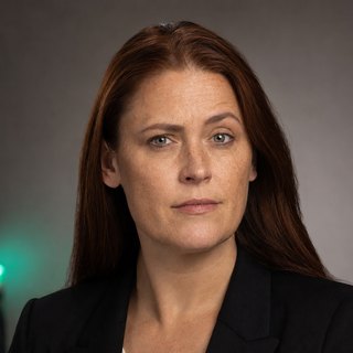 Photoreal portrait of Isla, Market Researcher