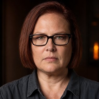 Photoreal portrait of Nora, Release Manager